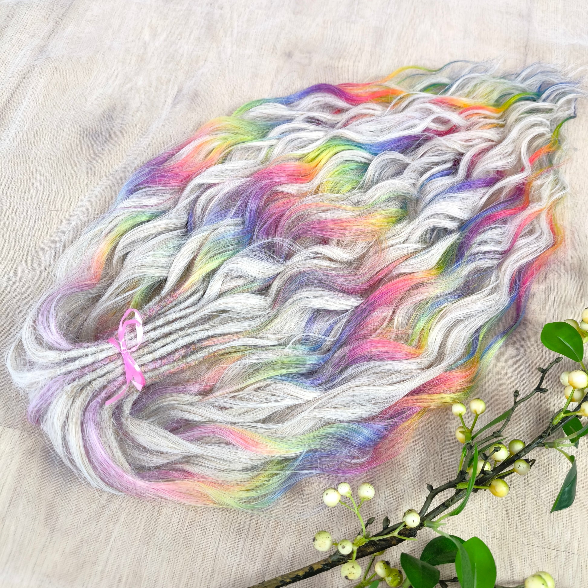 The mix of Platinum blonde and Rainbow/glitch/prism effect (2/3 parts of blonde + 1/3 part of rainbow) soft, lightweight, and reusable synthetic brushable double ended wavy dreadlocks (regular dreaded or push-up).