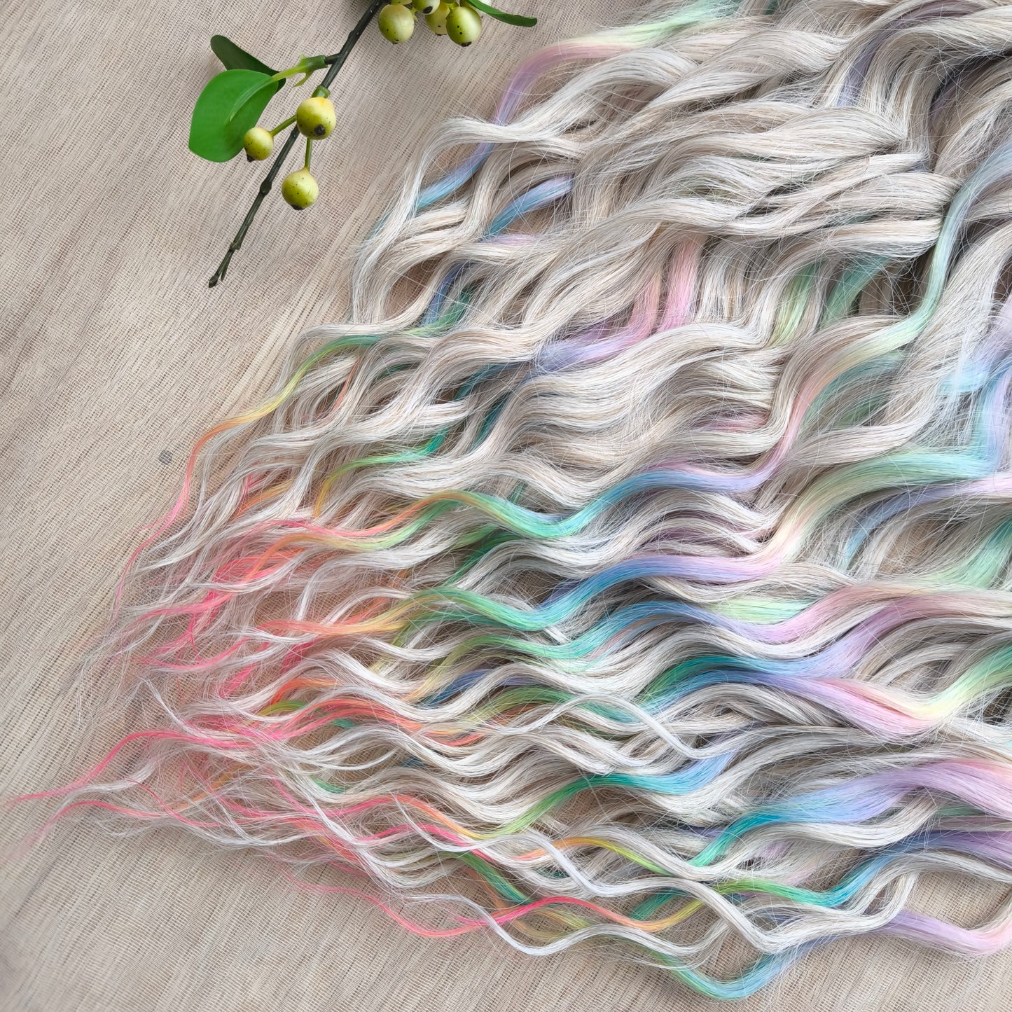 The mix of Platinum blonde and Rainbow/glitch/prism effect (2/3 parts of blonde + 1/3 part of rainbow) soft, lightweight, and reusable synthetic brushable double ended wavy dreadlocks (regular dreaded or push-up).