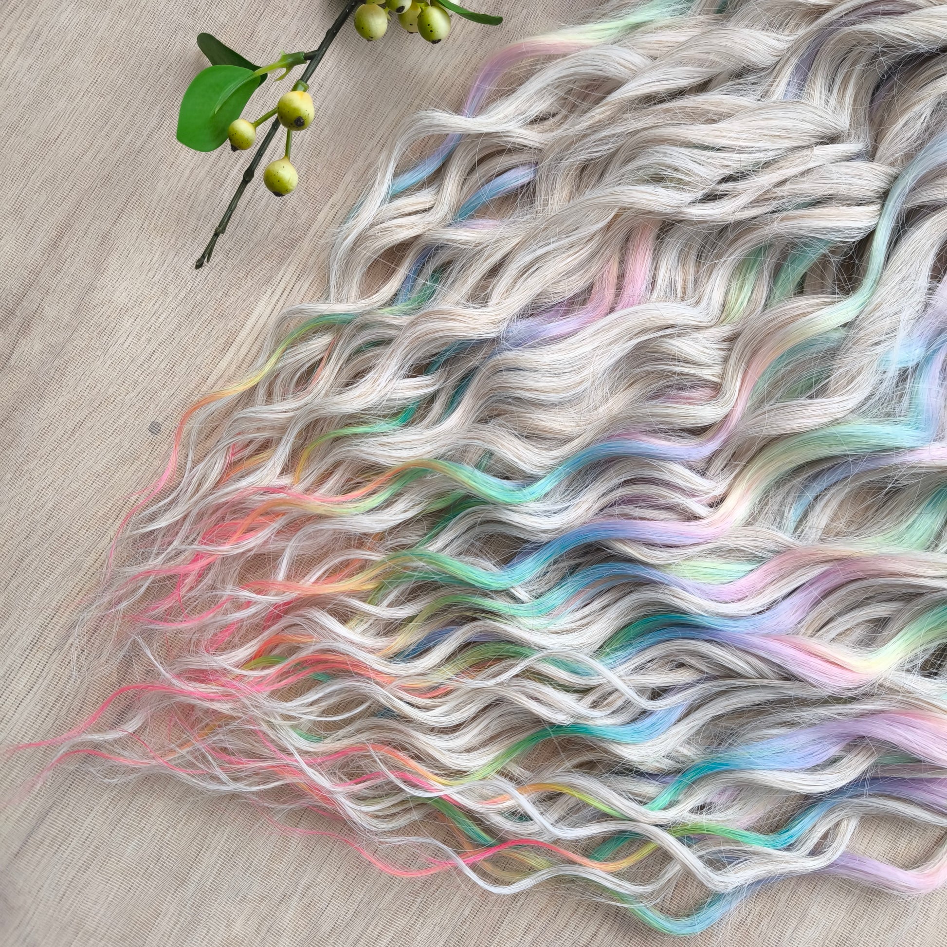 The mix of Platinum blonde and Rainbow/glitch/prism effect (2/3 parts of blonde + 1/3 part of rainbow) soft, lightweight, and reusable synthetic brushable double ended wavy dreadlocks (regular dreaded or push-up).