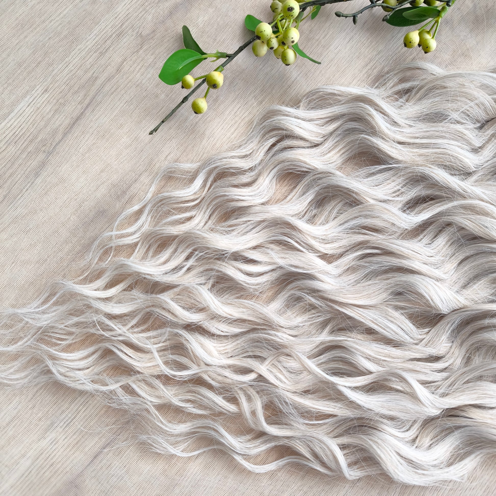 Platinum blonde soft, lightweight, and reusable synthetic brushable double ended wavy dreadlocks (regular dreaded, braided middle, or push-up).&nbsp;


The length:
Standard dreaded - 22-24 inches (55-60 cm), dreaded part ±4-5 inches
Braided middle - 22-24 inches (55-60 cm), braid ±4-5 inches folded (total ±8-10 inches)
Push-up / Dolly - 20-22 inches (50-55 cm), dreaded part ±4 inches (from working side)