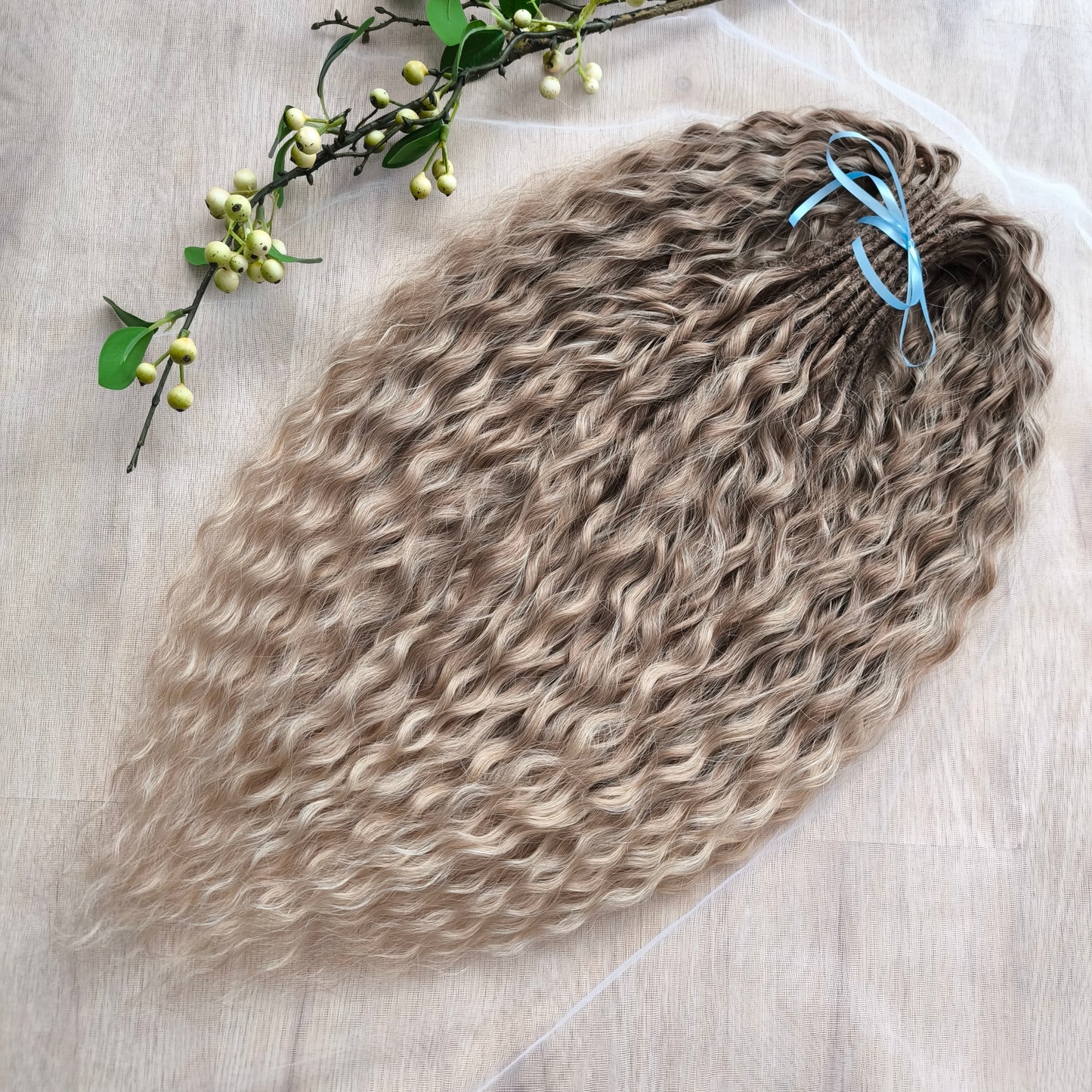 Ombre natural golden honey wheat blonde soft, lightweight, and reusable synthetic brushable double ended wavy dreadlocks (NOT BRUSHABLE).

The length:
Standard dreaded - 22-24 inches (55-60 cm), dreaded part ±3-4 inches
Push-up / Dolly - 20-22 inches (50-55 cm), dreaded part ±4 inches
