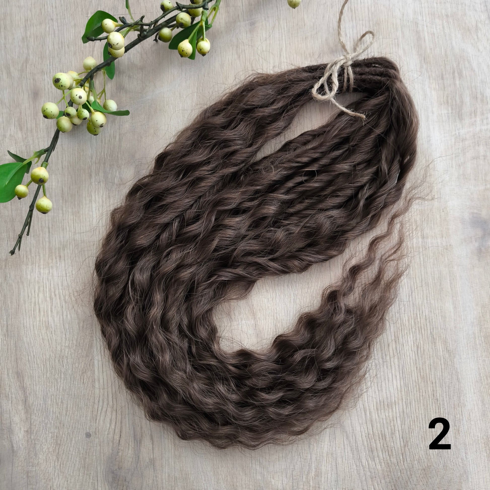 Soft, lightweight, and reusable synthetic sets of regular double ended curls (NOT BRUSHABLE) in brown shades:

1. dark chocolate brown;
2. middle brown
3. light brown
