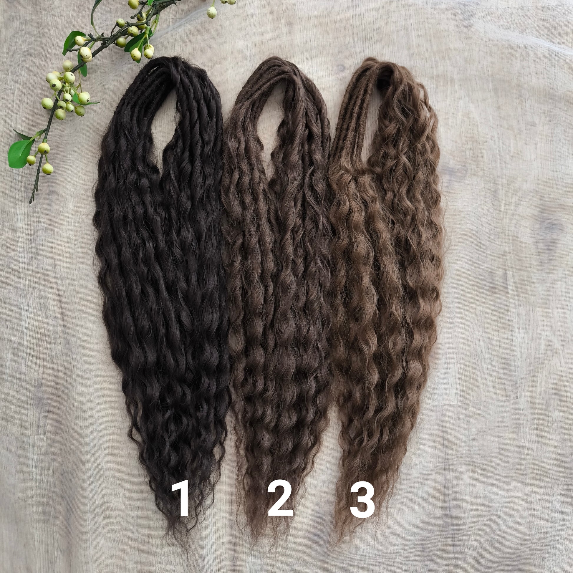 Soft, lightweight, and reusable synthetic sets of regular double ended curls (NOT BRUSHABLE) in brown shades:

1. dark chocolate brown;
2. middle brown
3. light brown