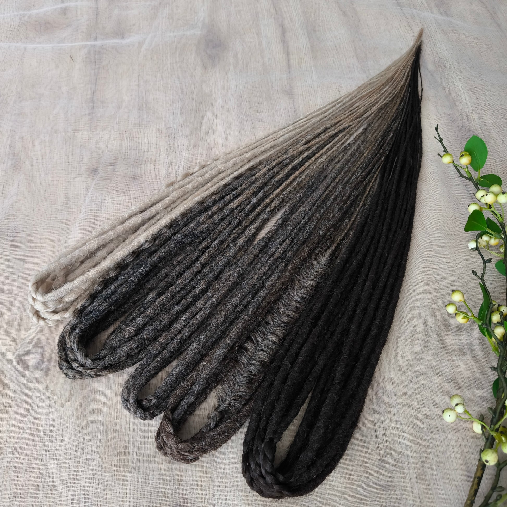 Wheat & Cocoa - a warm, natural blend of crochet dreads in wheat blonde, dark blonde with a smooth ombré transition, brown, and rich cocoa tones.

Length - 22-24 inches (55-60 cm)
Thickness of the dreads - ±0.8-1 cm