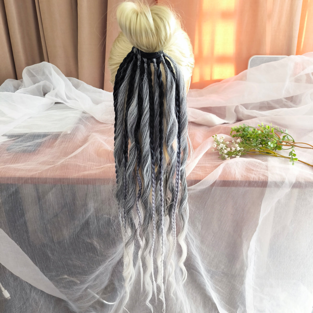 Grey, black, and white braids and curls on an elastic band — a simple way to transform a ponytail without installing a set