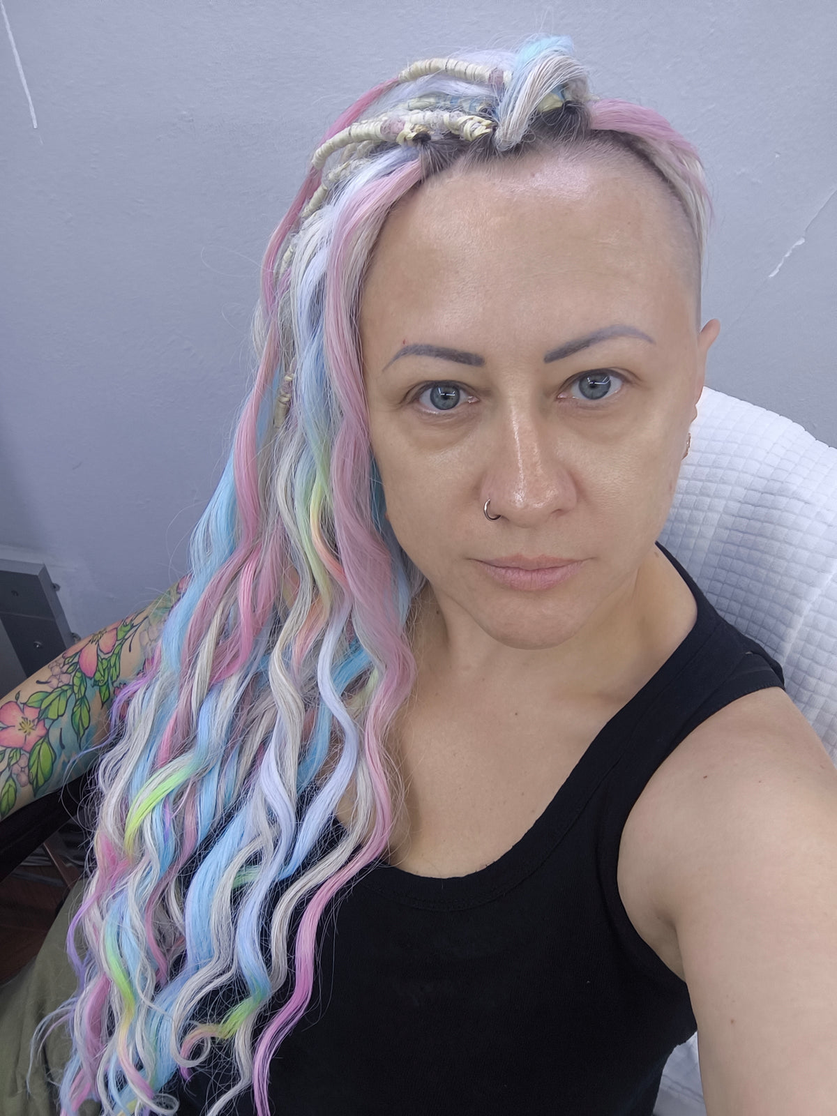 Cotton Candy - soft, lightweight, and reusable double ended synthetic brushable curls. A blend of platinum blonde, sky blue, pink, and rainbow colors creates a light, airy look full of soft color transitions.