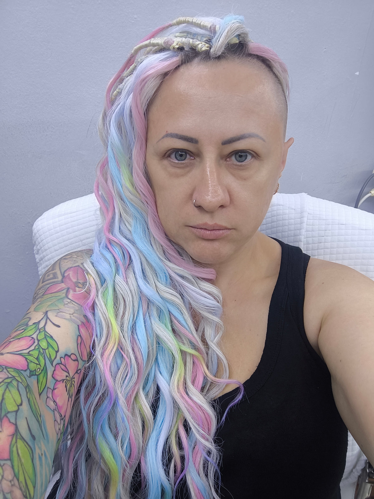 Cotton Candy - soft, lightweight, and reusable double ended synthetic brushable curls. A blend of platinum blonde, sky blue, pink, and rainbow colors creates a light, airy look full of soft color transitions.