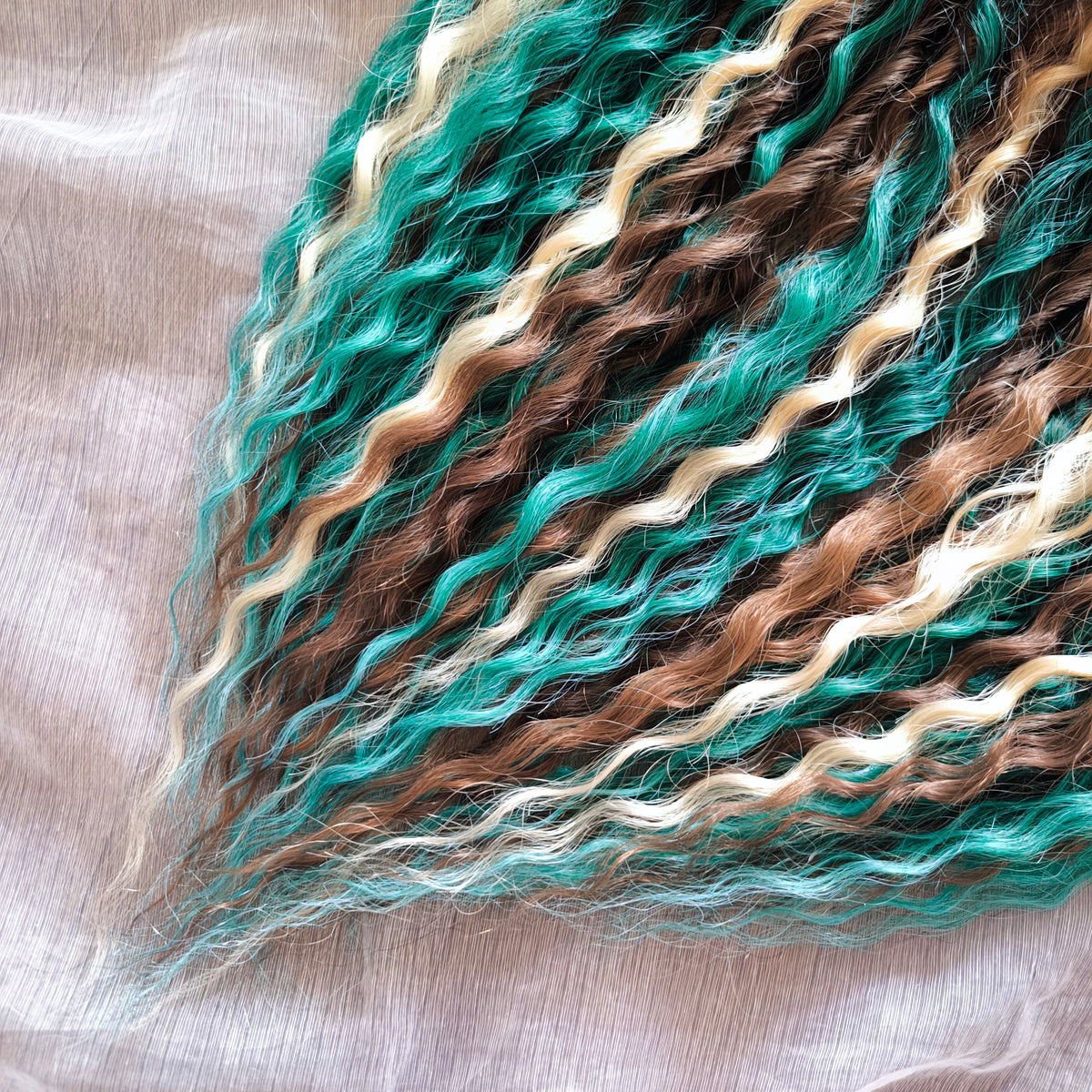 Dusky Grove - 50 double ended ready-to-ship, 2 shades of brown, golden blonde, forest green synthetic non-brushable wavy dreadlocks. Soft, lightweight, and reusable, woodland-inspired blend with a touch of dark, mysterious magic.