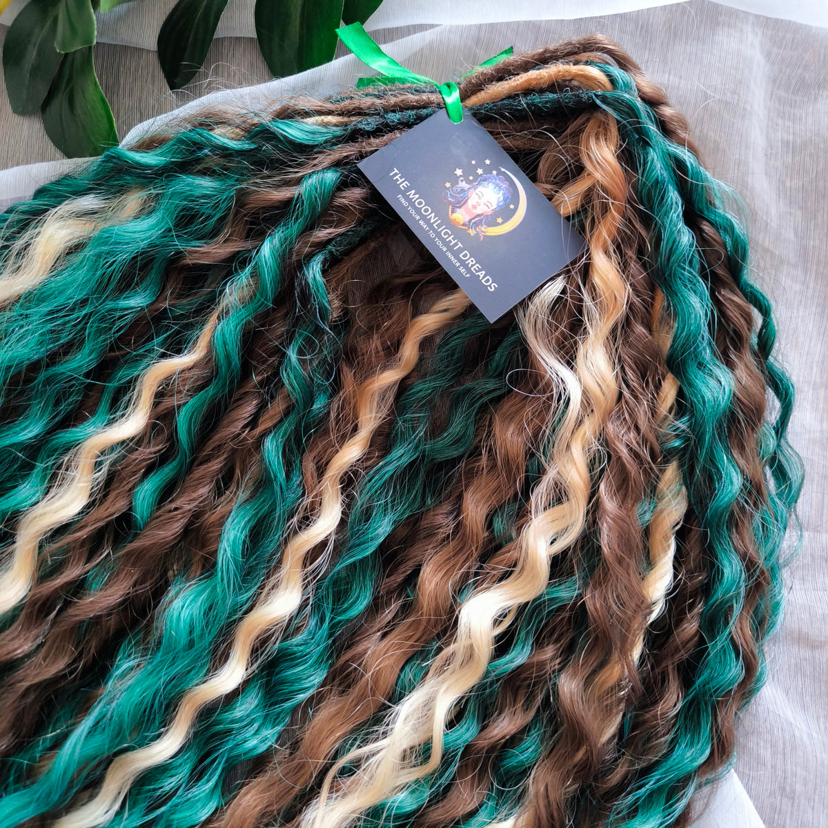 Dusky Grove - 50 double ended ready-to-ship, 2 shades of brown, golden blonde, forest green synthetic non-brushable wavy dreadlocks. Soft, lightweight, and reusable, woodland-inspired blend with a touch of dark, mysterious magic.