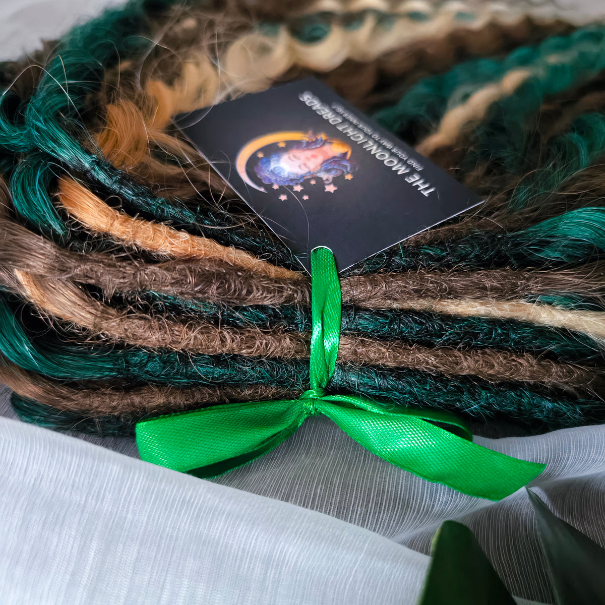 Dusky Grove - 50 double ended ready-to-ship, 2 shades of brown, golden blonde, forest green synthetic non-brushable wavy dreadlocks. Soft, lightweight, and reusable, woodland-inspired blend with a touch of dark, mysterious magic.