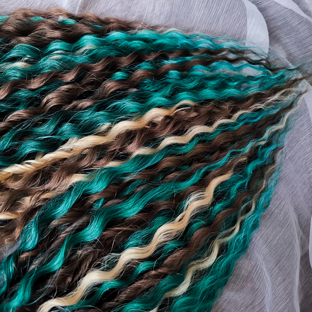 Dusky Grove - 50 double ended ready-to-ship, 2 shades of brown, golden blonde, forest green synthetic non-brushable wavy dreadlocks. Soft, lightweight, and reusable, woodland-inspired blend with a touch of dark, mysterious magic.