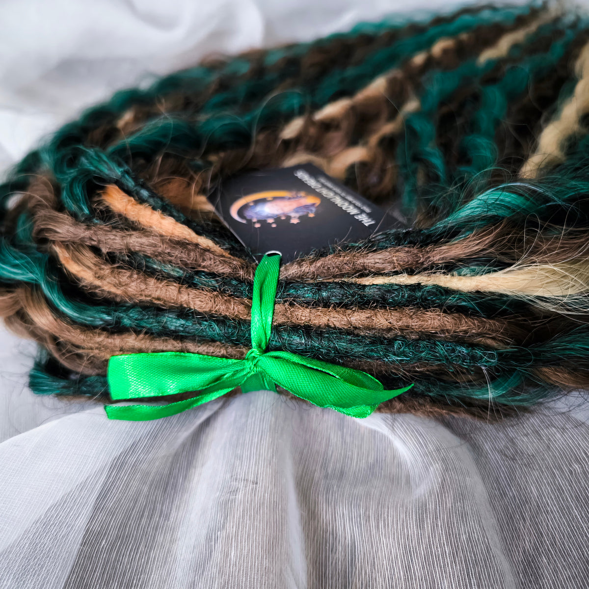 Dusky Grove - 50 double ended ready-to-ship, 2 shades of brown, golden blonde, forest green synthetic non-brushable wavy dreadlocks. Soft, lightweight, and reusable, woodland-inspired blend with a touch of dark, mysterious magic.