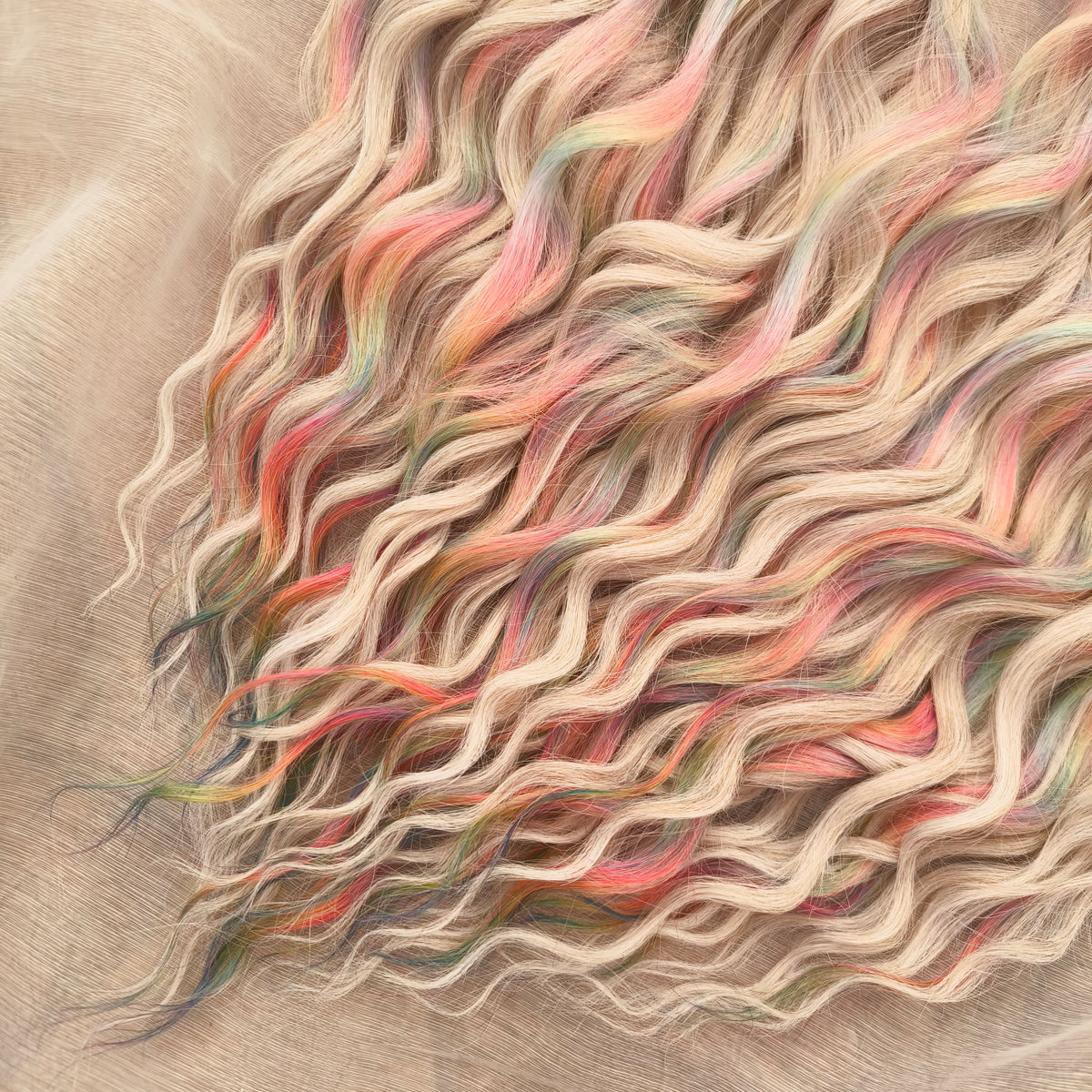 Fairy Dust - 50 DE soft, lightweight, and reusable synthetic standard dreaded brushable curls. A mix of platinum blonde and pastel rainbow/prism
