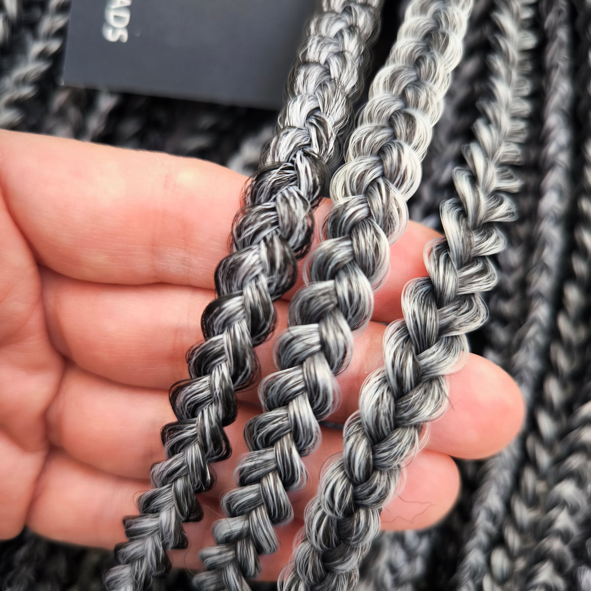Black Amethyst - 50 double ended ready-to-ship black and silver/grey synthetic 3D/stereo/heart braids. Soft, lightweight, and reusable dark mysterious monochromatic blend. 