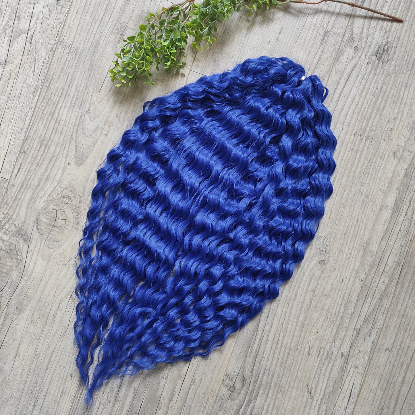 Soft, lightweight, and reusable synthetic sets of double ended regular curls (NOT BRUSHABLE) in blue shades:

1. sky blue;
2. deep blue;

The length:
Standard dreaded - 22-24 inches (55-60 cm), dreaded part `3-4 inches
Push-up / Dolly - 20-22 inches (50-55 cm), dreaded part `4 inches (from working side)