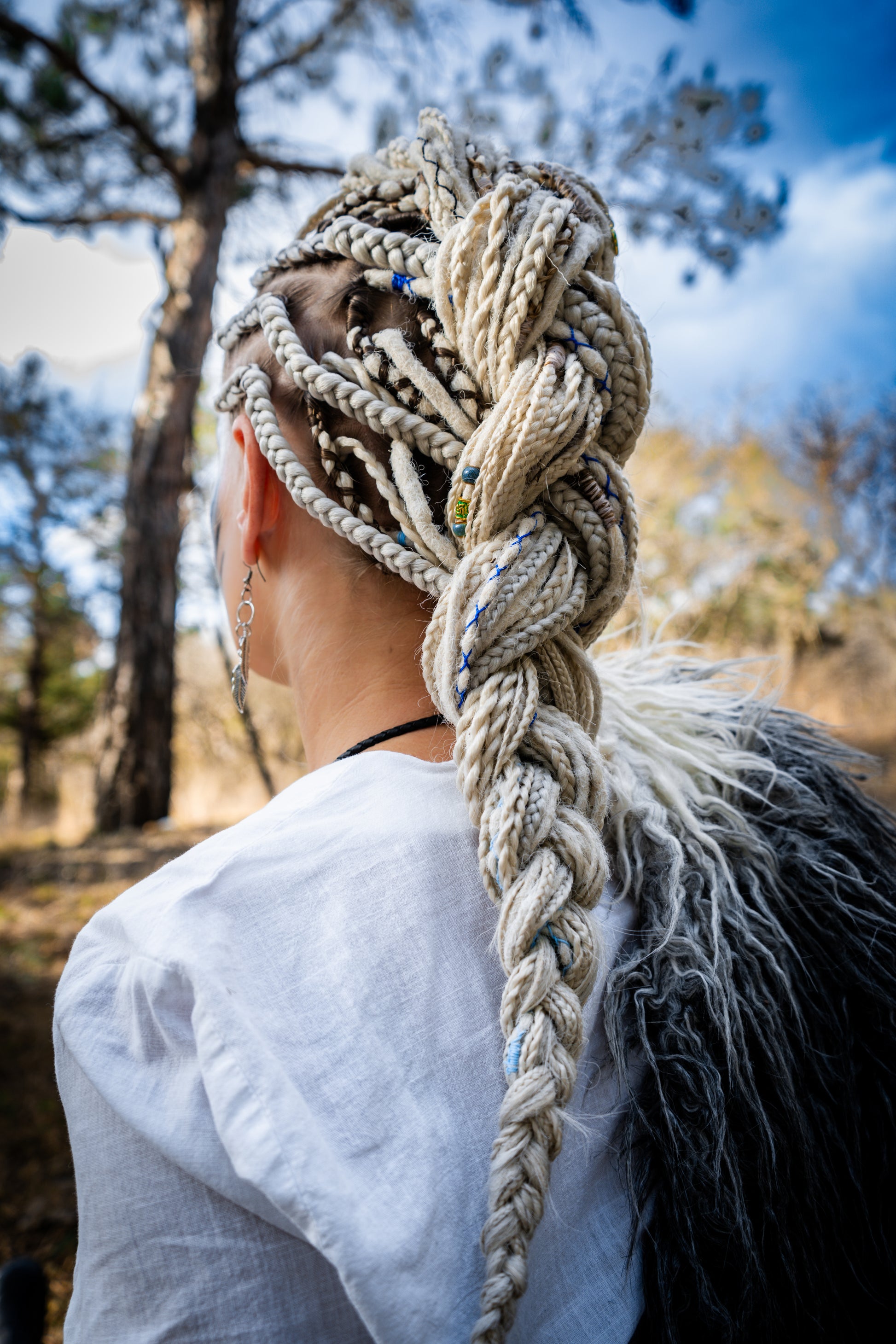This set of synthetic dreadlocks combines elements of a Viking-inspired aesthetic.
Scandinavian blonde double ended crochet bumpy dreads, braids, and Senegalese twists. Decoration is included. Reusable lightweight set made from high-quality synthetic hypoallergenic material kanekalon.

Standard length: ±22-24 inches (55-60 cm)
Thickness of dreads and braids: ±0.8 cm