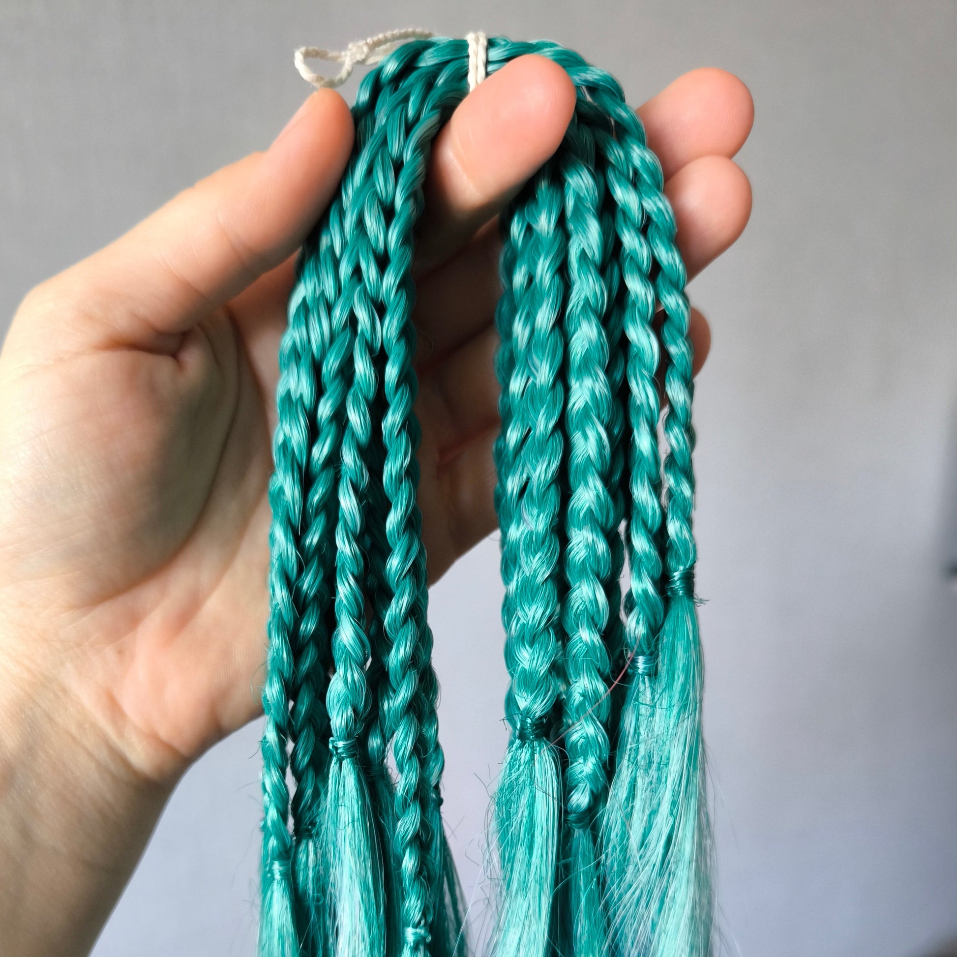 Colorful Rainbow prism (ombre from green to purple and red), soft, lightweight, and reusable synthetic sets of wavy double ended brushable dreadlocks.