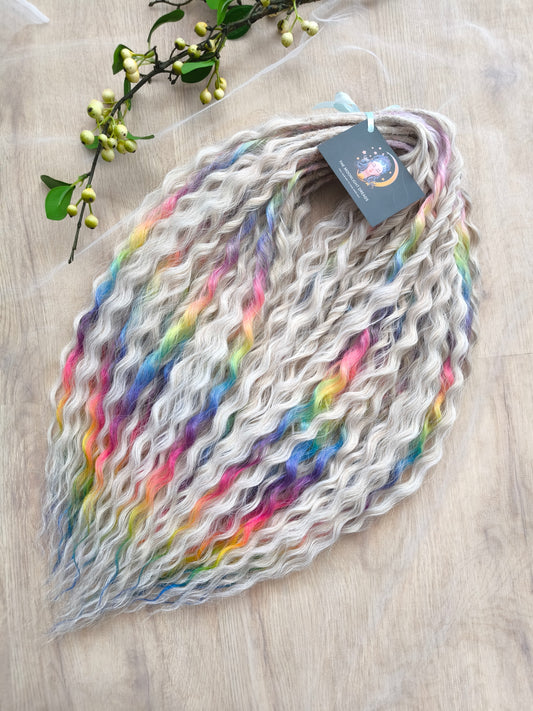 White Rainbow: the mix of Platinum Blonde (2/3 parts of blonde) + and Rainbow/glitch/prism effect (1/3 part of rainbow) soft, lightweight, and reusable synthetic brushable double ended wavy dreadlocks (NOT BRUSHABLE).