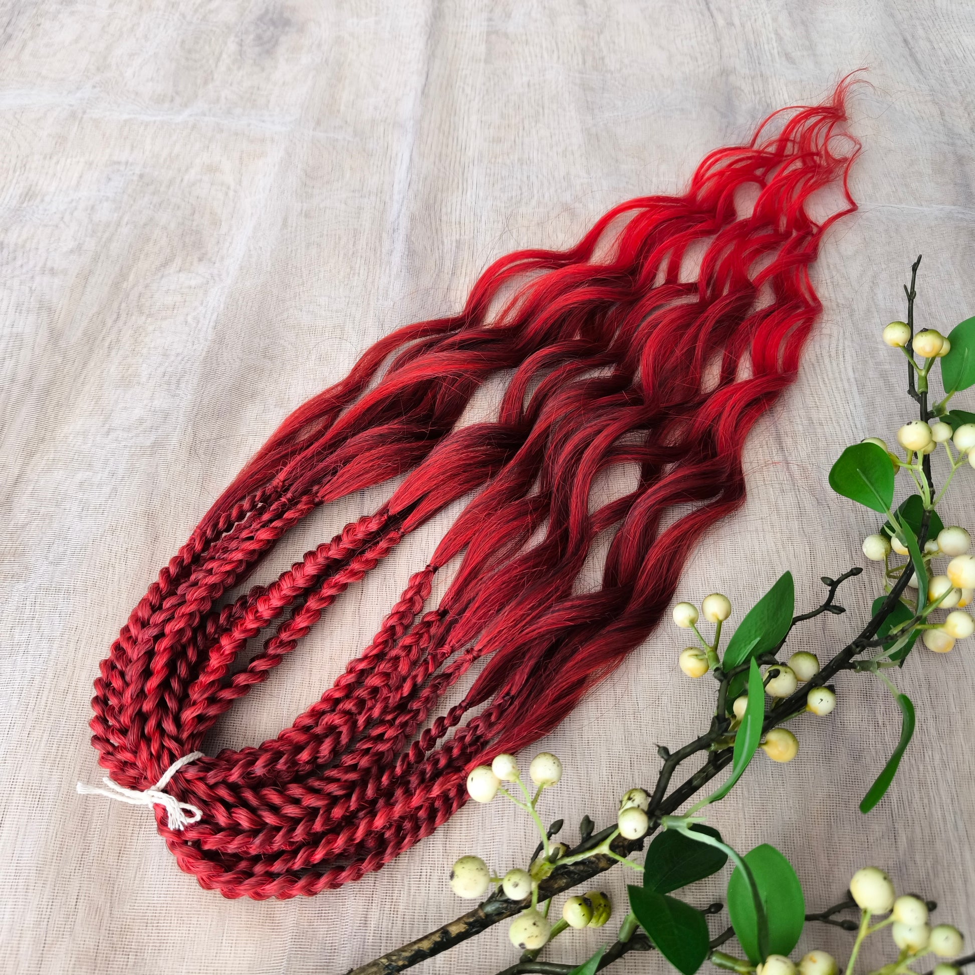 Ombre dark red to bloody red brushable, soft, lightweight, and reusable synthetic dreaded curls (standard dreaded, braided middle or push-up). 