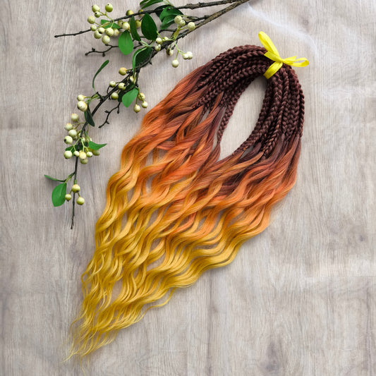Turn heads with this vibrant, fiery blend of colors — starting from deep chestnut roots, melting into warm copper and orange, and flowing into glowing golden yellow tips. Each strand feels like a brushstroke of sunset light.

Perfect for those who love bold, sunny looks and want to bring warmth and energy to their style. Lightweight, eye-catching, and full of personality — this set is ideal for summer festivals, photo shoots, or just expressing your inner fire.