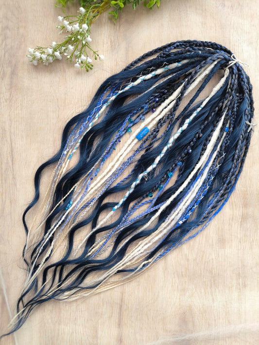 Deep blue see — navy blue, obmbre blue to blonde, and white partial set of 28 double ended synthetic dreadlocks, various braids, Senegalese twist, and brushable dreaded curls (decoration is included). Reusable lightweight set made from high-quality synthetic hypoallergenic material kanekalon.

Length: ±20-24 inches (50-60 cm)
Thickness of dreads and braids: ±0.6-0.8 cm
Dreaded part of curls ±3-4 inches (8-10 cm)
Weight with decoration: ±175 gr (6 oz)