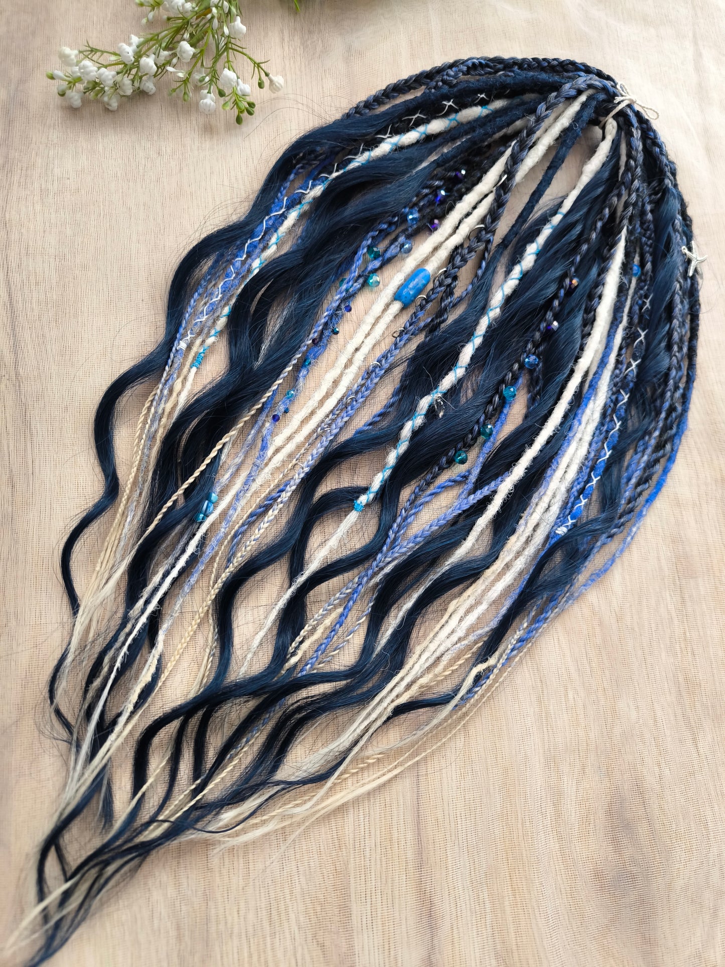 Deep blue see — navy blue, obmbre blue to blonde, and white partial set of 28 double ended synthetic dreadlocks, various braids, Senegalese twist, and brushable dreaded curls (decoration is included). Reusable lightweight set made from high-quality synthetic hypoallergenic material kanekalon.

Length: ±20-24 inches (50-60 cm)
Thickness of dreads and braids: ±0.6-0.8 cm
Dreaded part of curls ±3-4 inches (8-10 cm)
Weight with decoration: ±175 gr (6 oz)