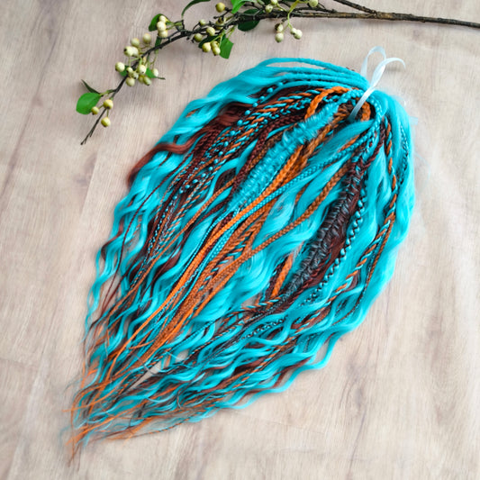 Ginger Sky: soft, lightweight, and reusable double ended various DE synthetic braids and regular dreaded brushable curls. A mix of turquoise green, red, copper, and orange colors.

The length is 22-24 inches (55-60 cm)
Dreaded part of curls: 4-5 inches
Thickness of braids ±0.8 cm