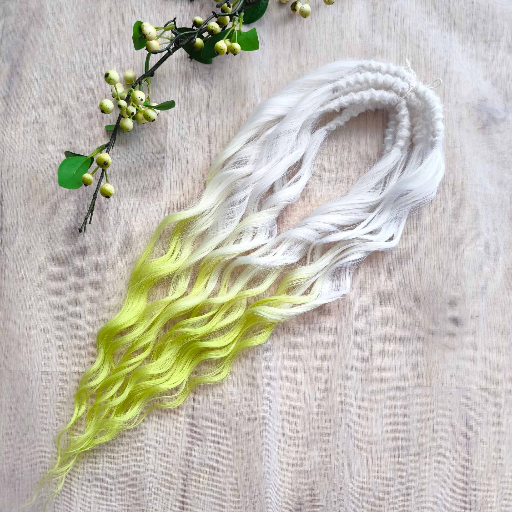 Lemon Frost - radiant ombré starts with an icy white base, melts into soft pastel lemon, and flows into a bold neon yellow-green at the tips. Soft, lightweight, and reusable synthetic brushable double ended wavy dreadlocks (regular dreaded, braided middle, or push-up).