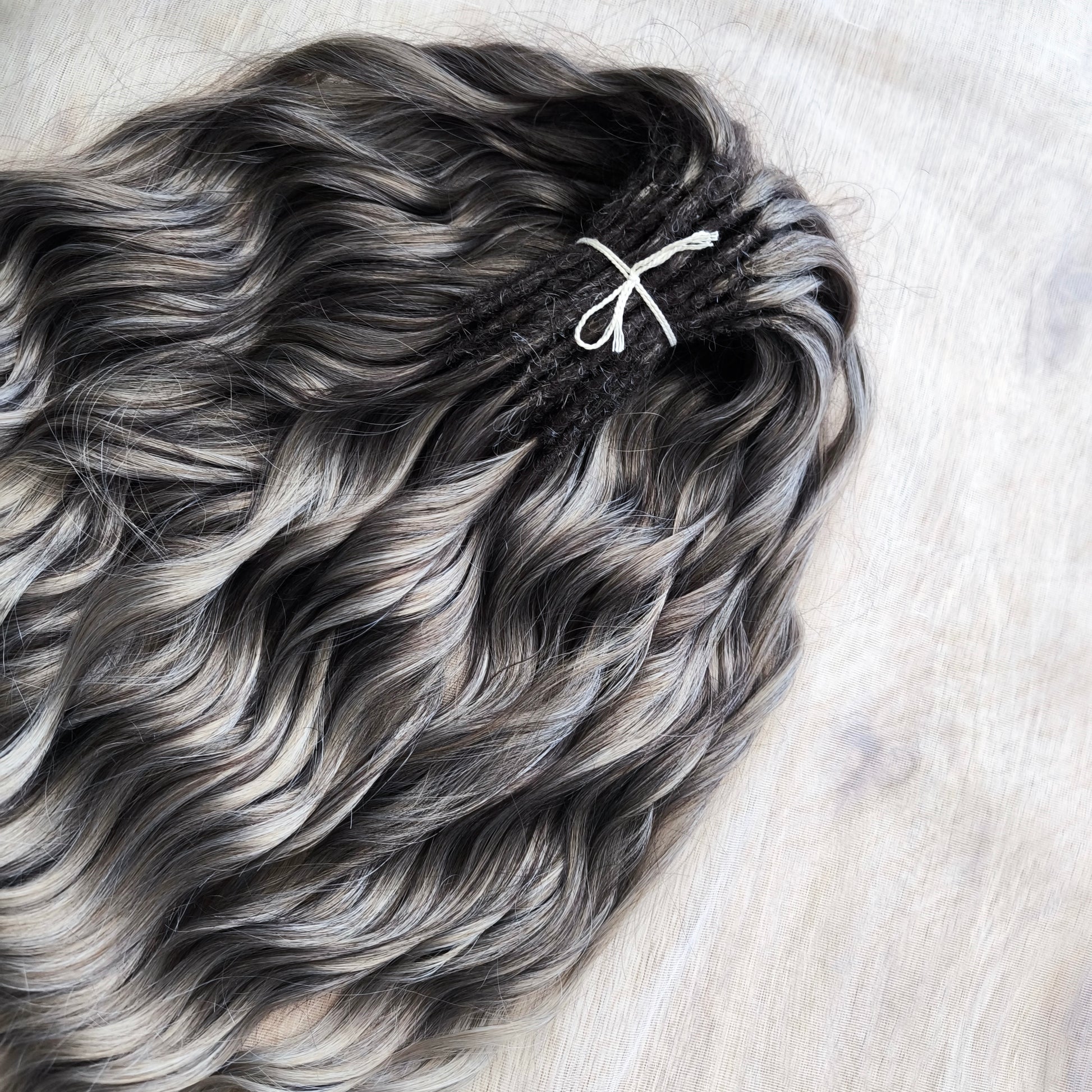 Ash ombre from light brown to wheat blonde soft, lightweight, and reusable synthetic brushable double ended wavy dreadlocks (regular dreaded, braided middle or push-up).