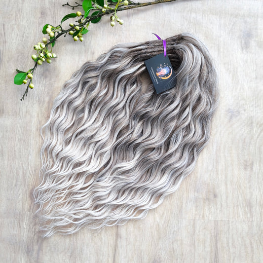 Ombre from dark ash to platinum blonde soft, lightweight, and reusable synthetic brushable double ended wavy dreadlocks (regular dreaded, braided middle, or push-up).


The length:
Standard dreaded - 22-24 inches (55-60 cm), dreaded part ±4-5 inches
Braided middle - 22-24 inches (55-60 cm), braid ±4-5 inches folded (total ±8-10 inches)
Push-up / Dolly - 20-22 inches (50-55 cm), dreaded part ±4 inches (from working side)