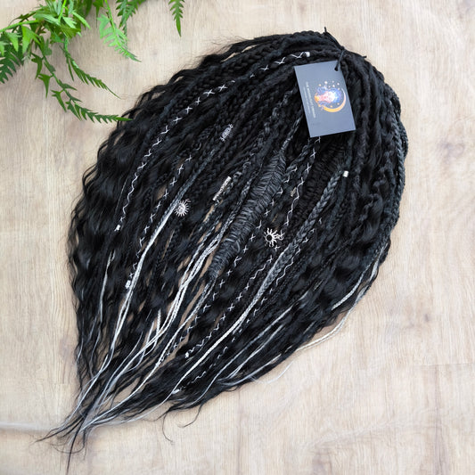 Pagan Witch — black, gray, and white/blonde set of 55 double ended synthetic bumpy dreads, braids, Senegalese twist, and dreaded curls (decoration is included). Reusable lightweight set made from high-quality synthetic hypoallergenic material kanekalon.

Standard length: ±22-24 inches (55-60 cm)
Thickness of dreads and braids: ±0.6-0.8 cm
Dreaded part of curls ±3-4 inches (8-10 cm)
Weight with decoration: ±310 gr (11 oz)