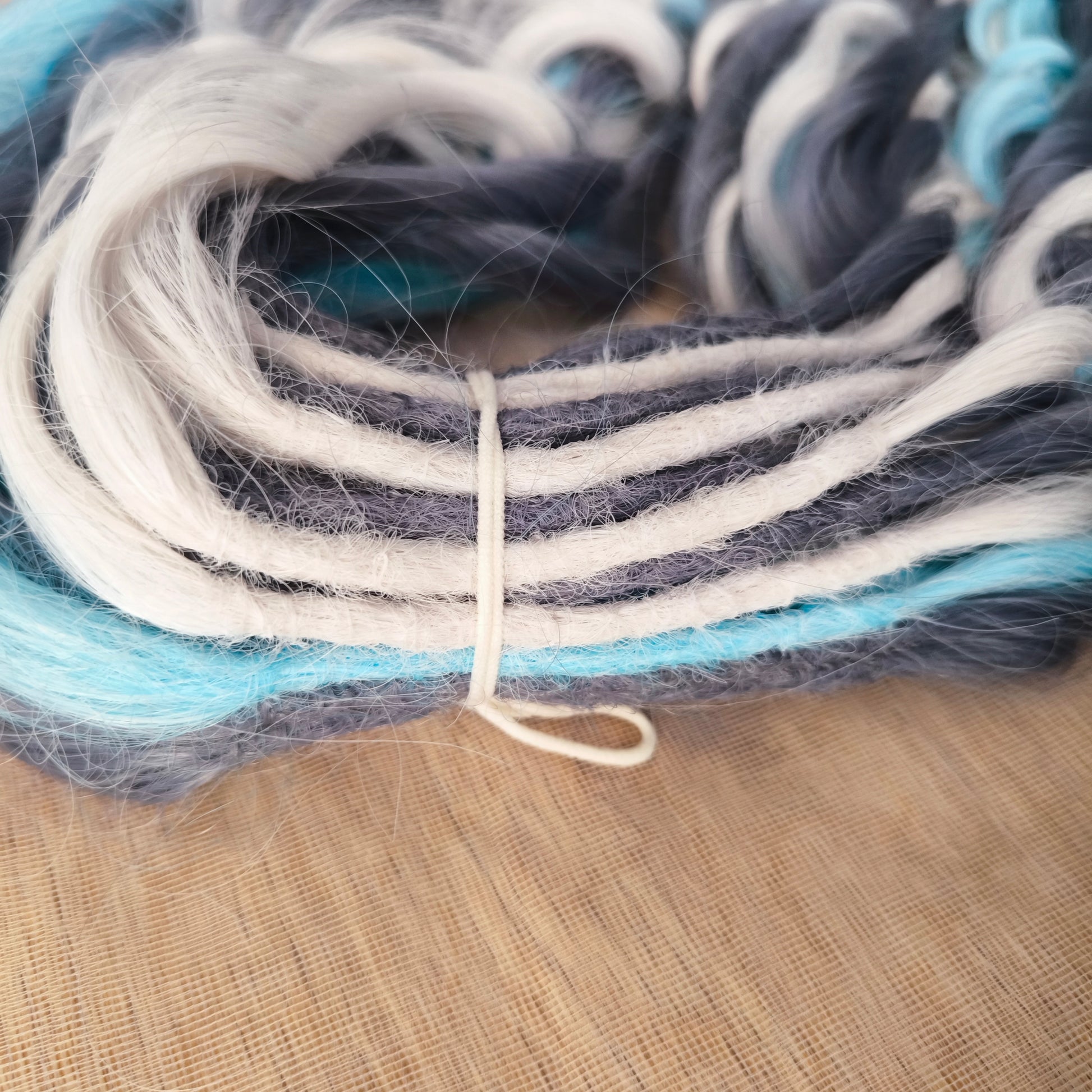 Let your hair channel the raw beauty of the Arctic with this striking icy blend. Arctic Ice features cool-toned waves in glacier blue, soft white, and smoky gray, flowing together like frozen mist over a winter sea.

Elegant, bold, and ethereal — this set is perfect for anyone who loves a crisp, dramatic look with an icy twist.