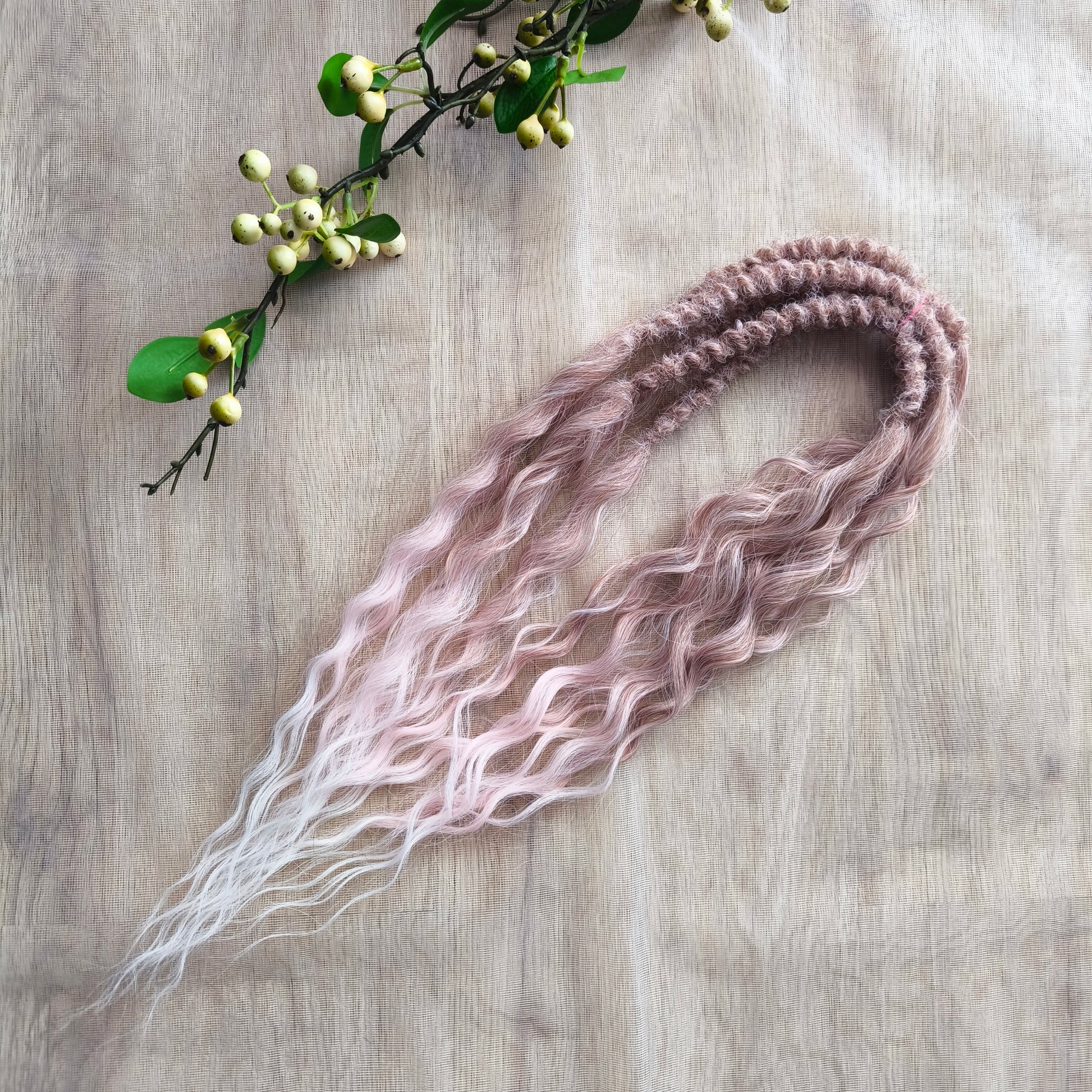 soft, lightweight, and reusable synthetic set of double ended NON-BRUSHABLE ombre from pinky wheat blond to pink and white curls. 