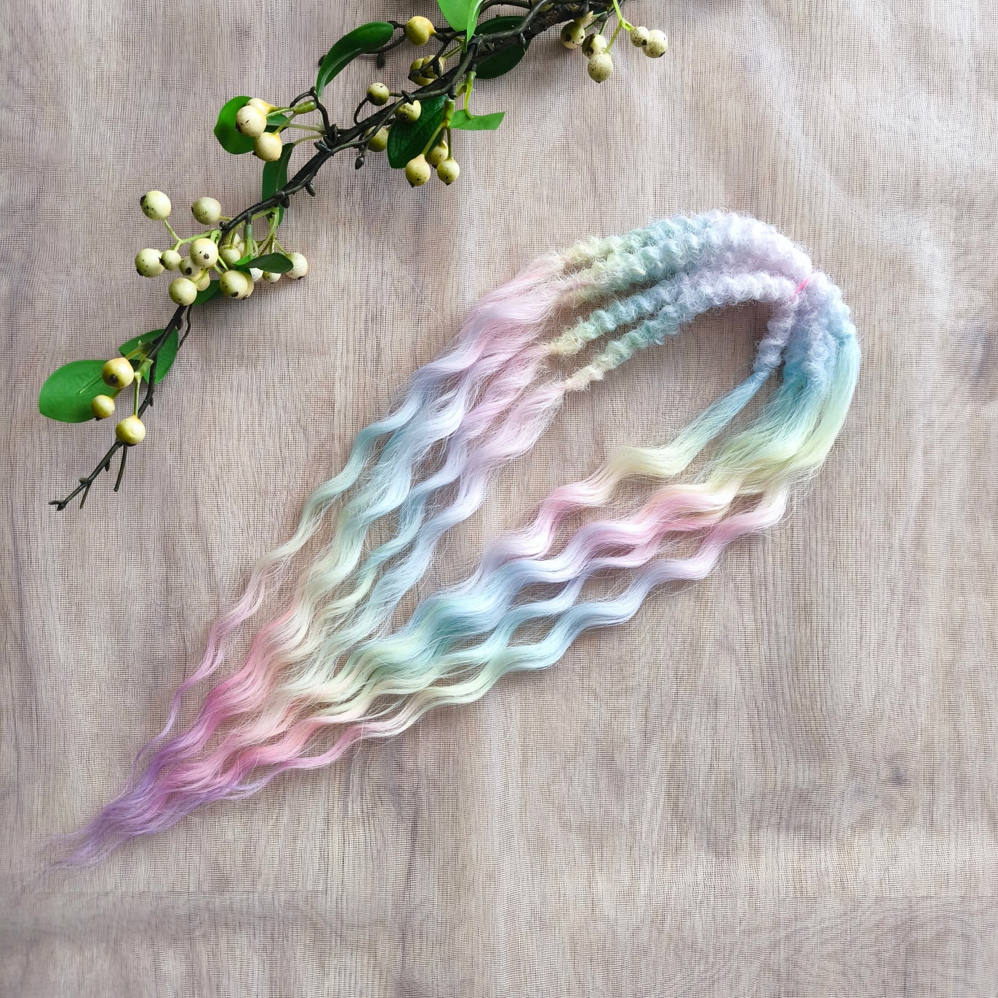 soft, lightweight, and reusable synthetic set of double ended NON-BRUSHABLE pastel rainbow curls. 