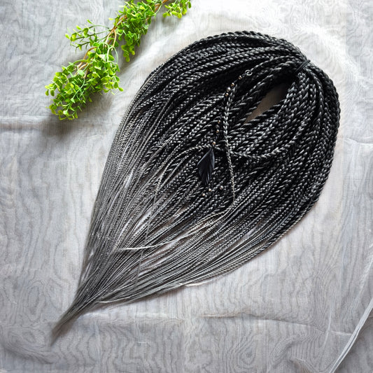 The set of 57 double ended synthetic braids and Senegalese twists ombre from black to grey "Graffit"

Standard length: 22-24 inches (55-60 cm)
Thickness of braids: ~0.8-1 cm