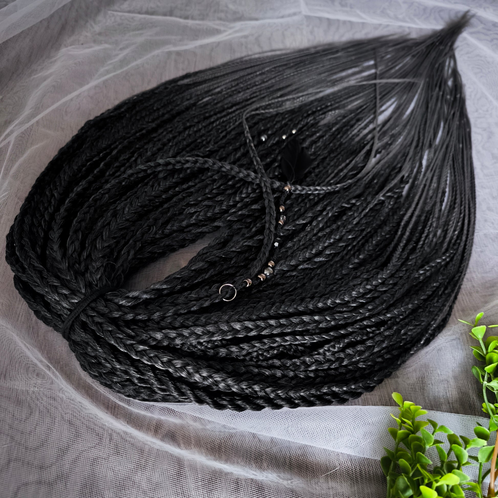 The set of 57 double ended synthetic braids and Senegalese twists ombre from black to grey "Graffit"

Standard length: 22-24 inches (55-60 cm)
Thickness of braids: ~0.8-1 cm
