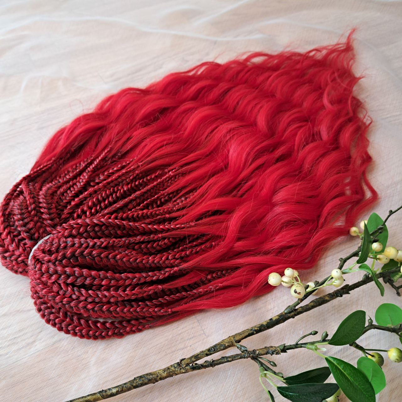 Vibrant red soft, lightweight, and reusable 50 double ended synthetic braids with loose wavy brushable ends.

The length is 22-24 inches (55-60 cm), and the braided part is approximately 5 inches (13 cm) folded.