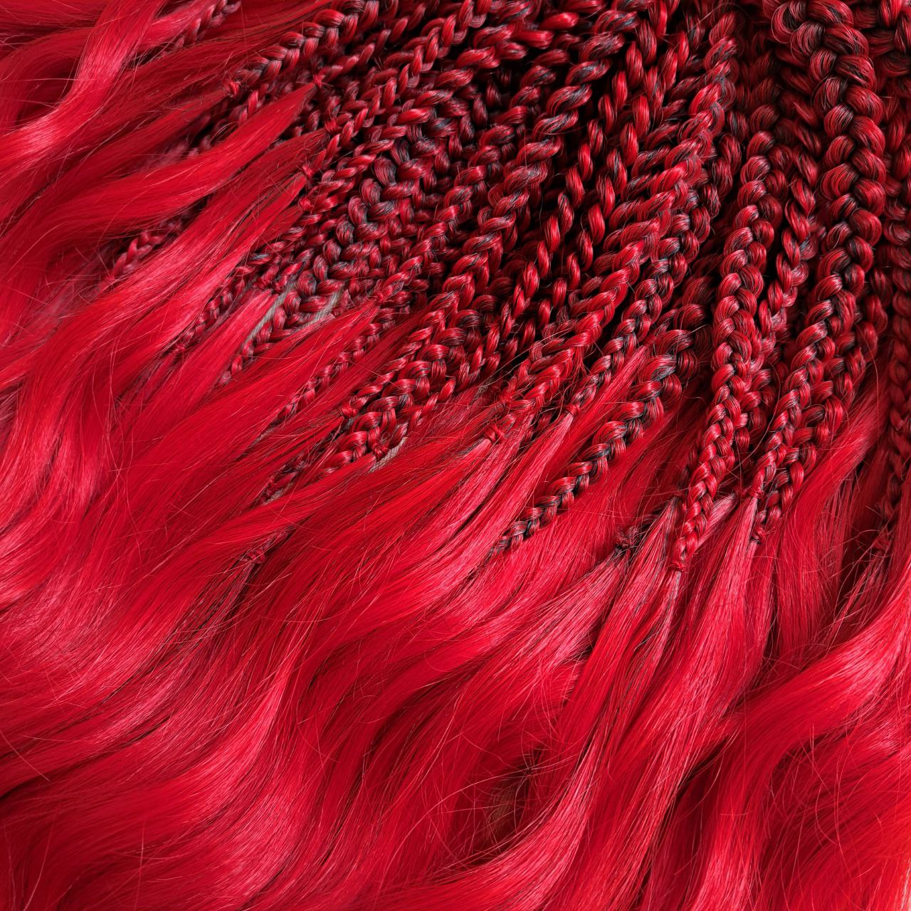 Vibrant red soft, lightweight, and reusable 50 double ended synthetic braids with loose wavy brushable ends.

The length is 22-24 inches (55-60 cm), and the braided part is approximately 5 inches (13 cm) folded.
