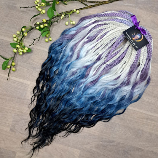 This set blends soft lilac, icy blonde, cool blue, and deep navy into a clean, cold-toned gradient. Lightweight, brushable, and reusable synthetic double-ended wavy dreadlocks with a smooth transition between shades.
Perfect for those who prefer crisp, cool colors and a fresh winter-inspired look.