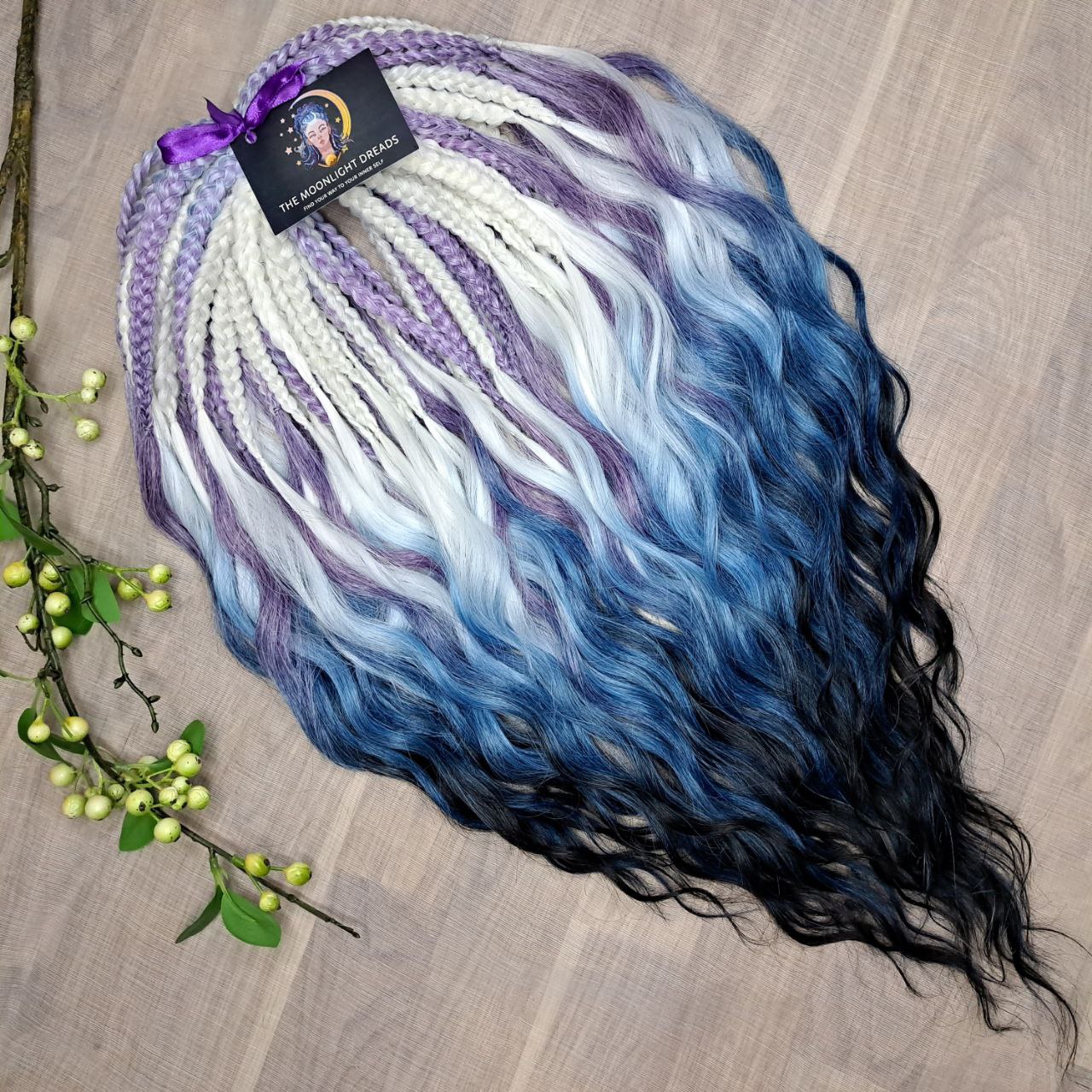 This set blends soft lilac, icy blonde, cool blue, and deep navy into a clean, cold-toned gradient. Lightweight, brushable, and reusable synthetic double-ended wavy dreadlocks with a smooth transition between shades.
Perfect for those who prefer crisp, cool colors and a fresh winter-inspired look.
