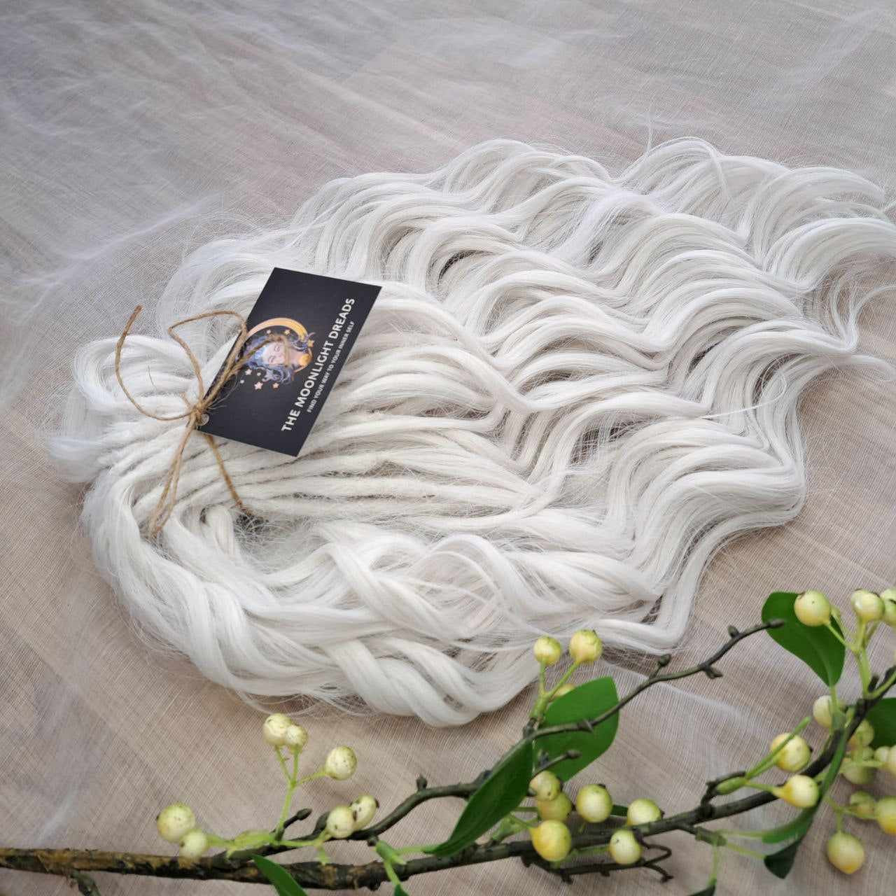 White soft, lightweight, and reusable 60 double ended synthetic standard dreaded brushable curls

Length: 16 inches (40 cm)
Dreaded part: approximately 3-4 inches (8-10 cm)
Weight: ±290 gr (10,2 oz)