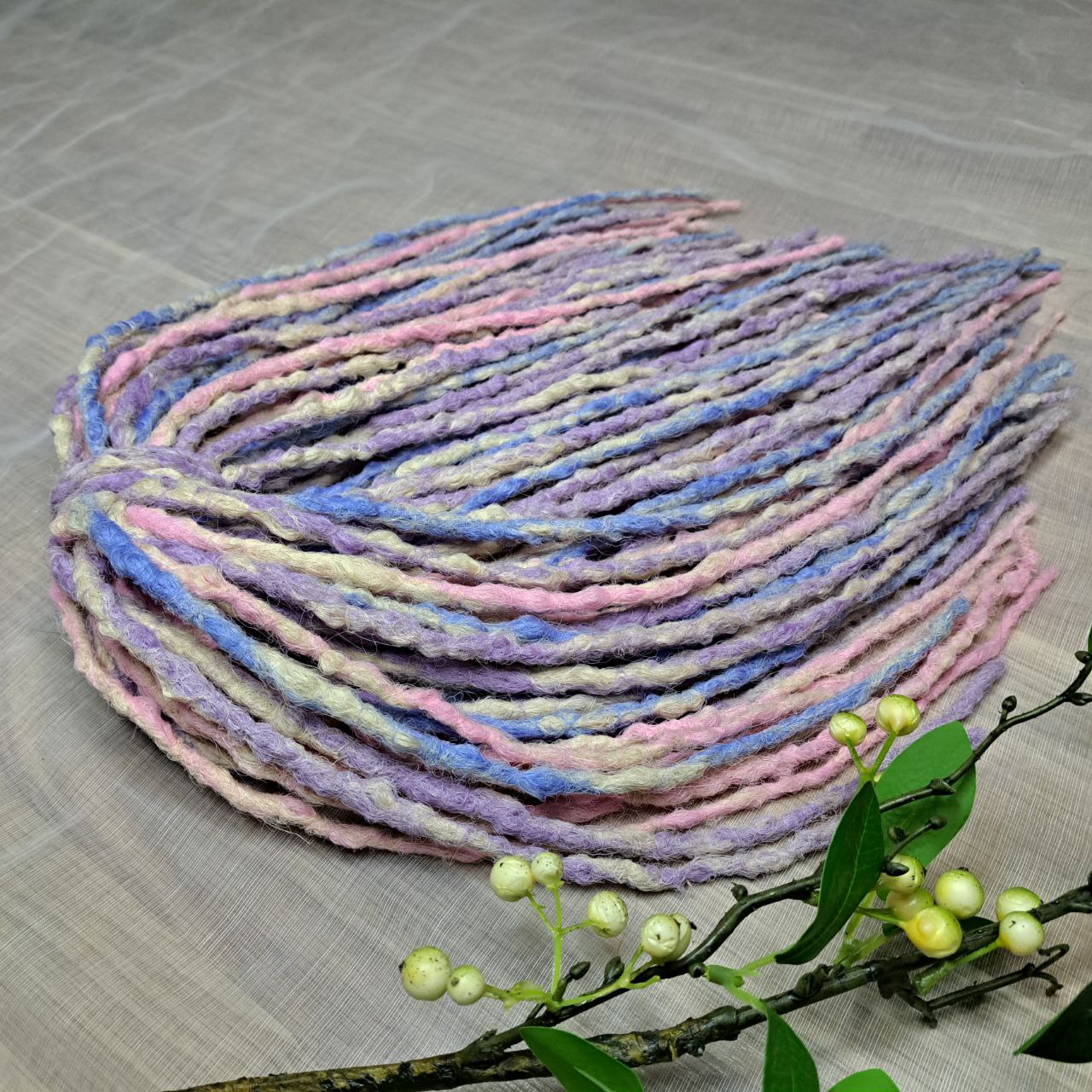 Pastel Cloud - a soft pastel mix of lavender, baby blue, blush pink, and creamy blonde. Soft, lightweight, and reusable 49 double ended synthetic bumpy dreadlocks with blunt ends give a calm, airy look.

Length: ≈15-16 inches (≈38-40 cm)
Thickness of dreads and braids: ≈0.8-1 cm
Weight: ≈260 gr (≈9,17 oz)