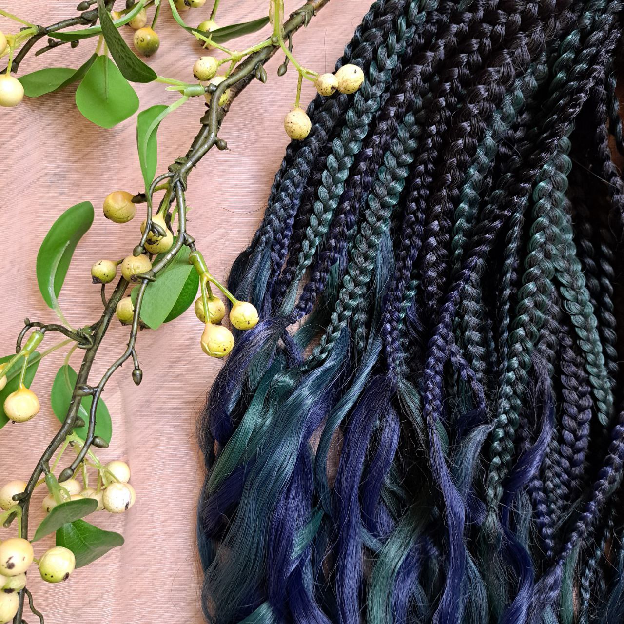 Midnight Forest - A deep blend of navy blue, dark teal, and forest green with a smooth, natural transition. Soft, lightweight, and reusable set of 54 double ended synthetic brushable curls with braided middle.

Length: ±25-26 inches (63-66 cm)
Braided part of curls ±10 inches  (25 cm) folded - 20" (50 cm) total.
Weight: ±390 gr (13,8 oz)