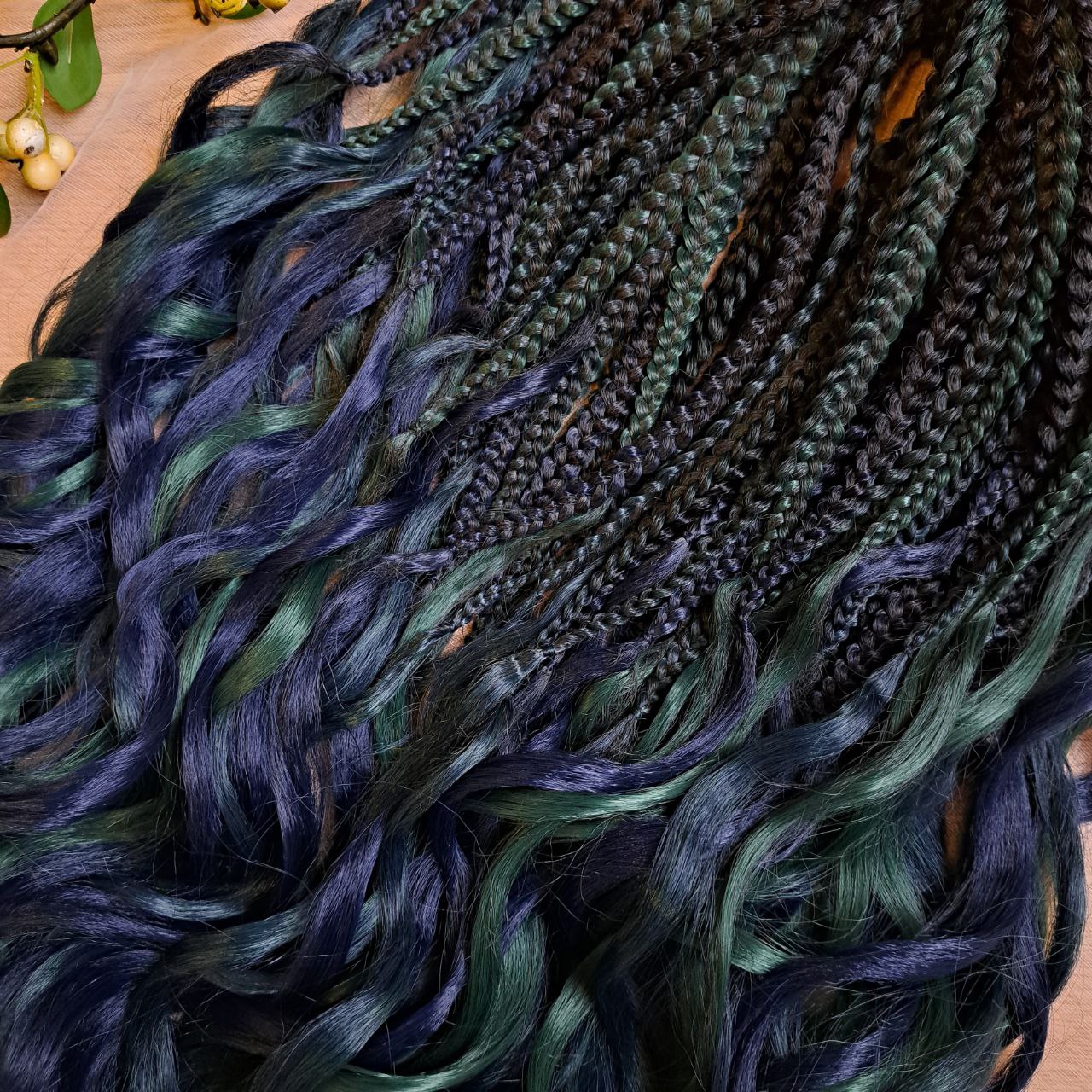 Midnight Forest - A deep blend of navy blue, dark teal, and forest green with a smooth, natural transition. Soft, lightweight, and reusable set of 54 double ended synthetic brushable curls with braided middle.

Length: ±25-26 inches (63-66 cm)
Braided part of curls ±10 inches  (25 cm) folded - 20" (50 cm) total.
Weight: ±390 gr (13,8 oz)