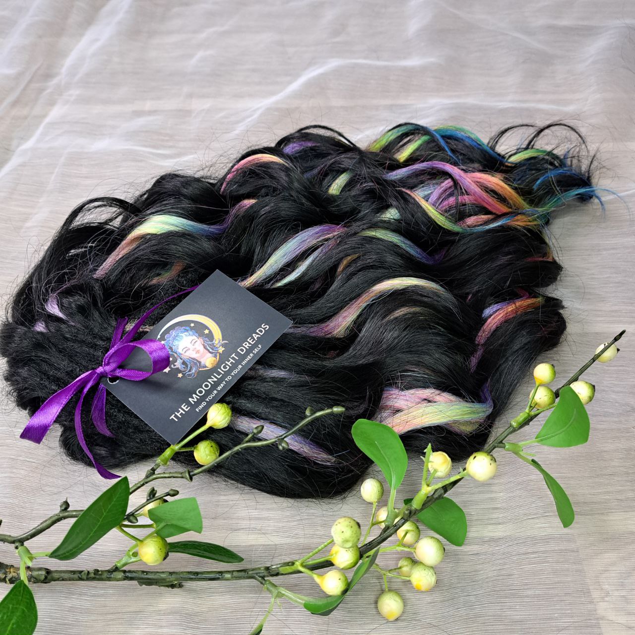 Black Rainbow - 60 DE soft, lightweight, and reusable synthetic standard dreaded brushable curls Manasi. Black base blended with rainbow/prism/glitch effect accents. 

Length: 16 inches (40 cm)
Dreaded part: approximately 3-4 inches (8-10 cm)
Weight: ±300 gr (10,6 oz)