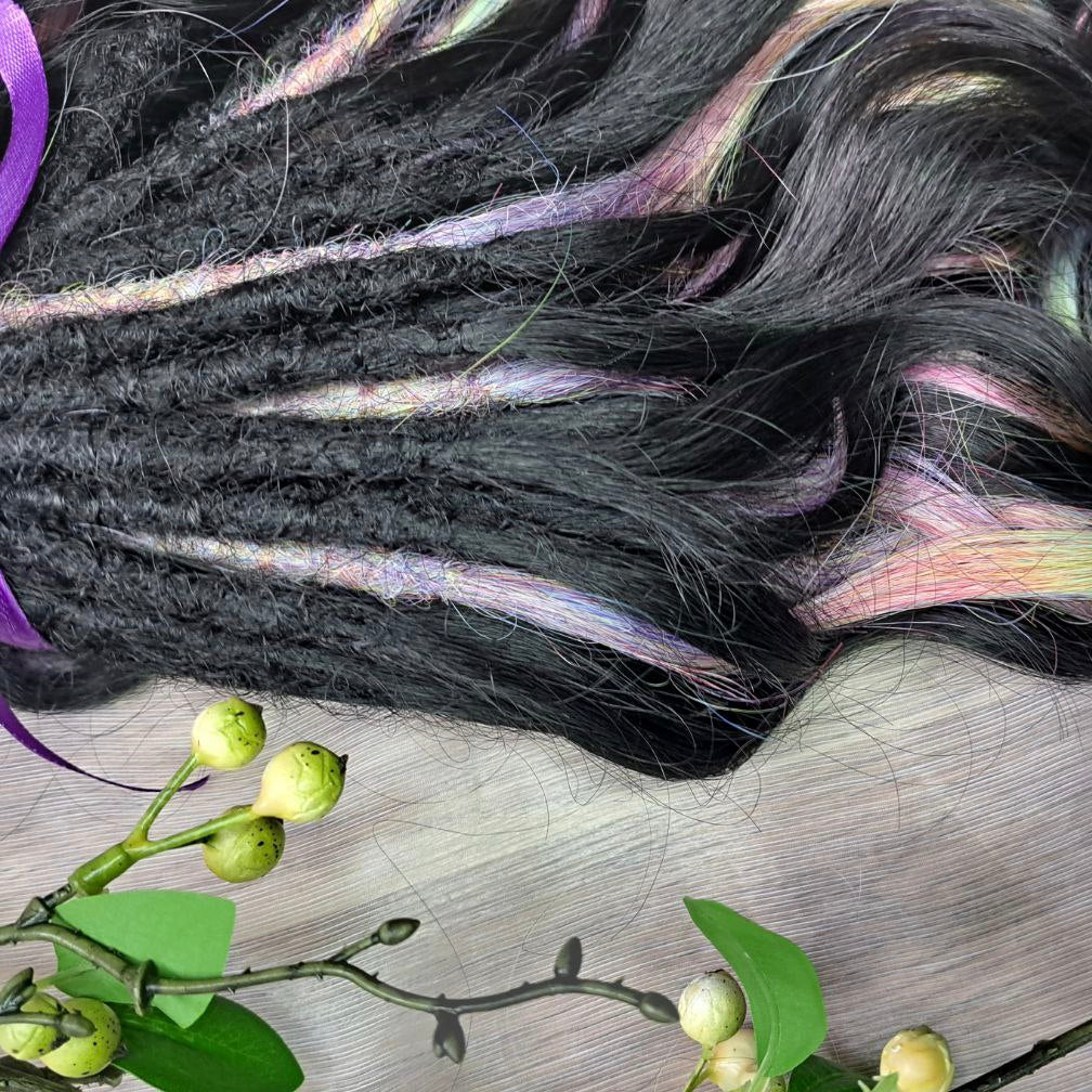 Black Rainbow - 60 DE soft, lightweight, and reusable synthetic standard dreaded brushable curls Manasi. Black base blended with rainbow/prism/glitch effect accents. 

Length: 16 inches (40 cm)
Dreaded part: approximately 3-4 inches (8-10 cm)
Weight: ±300 gr (10,6 oz)