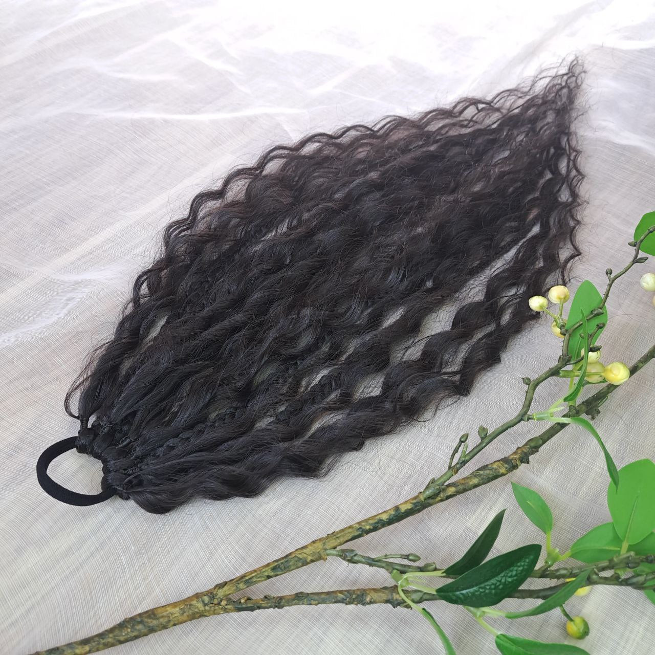 Braids, dreads, and curls on an elastic band — a simple way to transform a ponytail without installing a set. Easy to put on and remove whenever you like. A great option if you can’t install dreads or braids. Also, a perfect gift for kids 🎁

These scrunchies add instant length, volume, and texture — whether you prefer bold colors or natural shades.

Length: 22–24 inches.
Each hair tie includes 12–14 pieces, depending on the style.

Choose from the available designs shown, or contact us for a custom order.