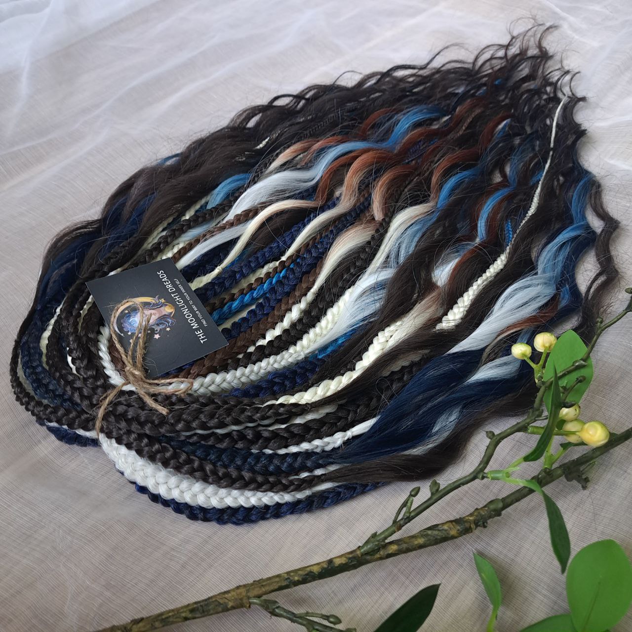 Blue Chocolate: set of braided middle curls and regular braids in a deep mix of dark chocolate tones with white, icy blue and navy accents. Soft, lightweight, and reusable.

Standard length: ±22-24 inches (55-60 cm)
Thickness of braids: ±0.8 cm
Braided part of curls: ±4–5 inches folded (total ±8–10 inches)