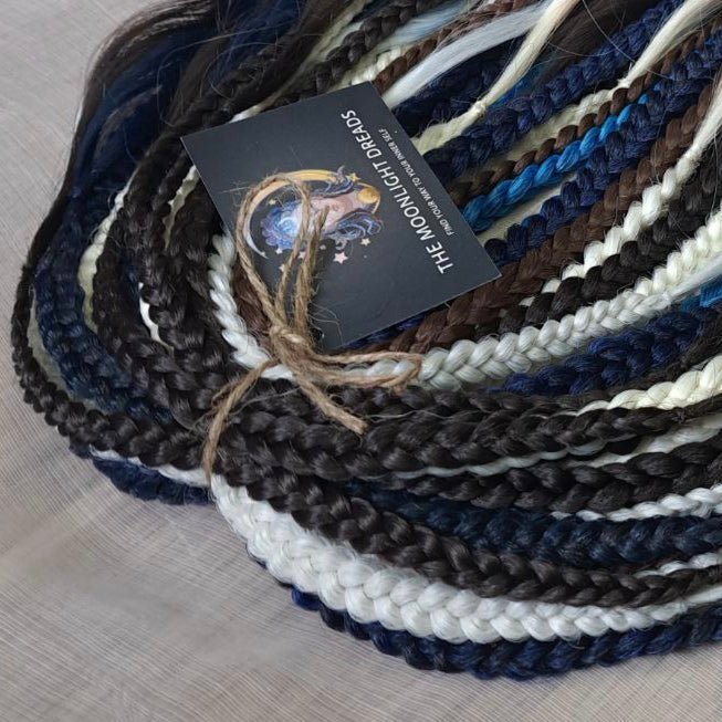 Blue Chocolate: set of braided middle curls and regular braids in a deep mix of dark chocolate tones with white, icy blue and navy accents. Soft, lightweight, and reusable.

Standard length: ±22-24 inches (55-60 cm)
Thickness of braids: ±0.8 cm
Braided part of curls: ±4–5 inches folded (total ±8–10 inches)