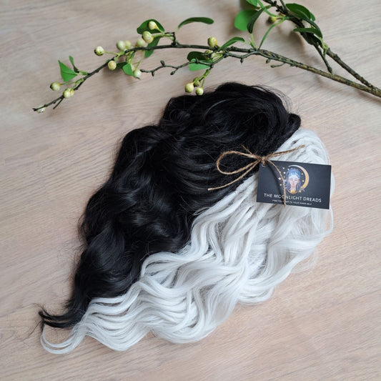 Black & White soft, lightweight, and reusable 60 double ended synthetic standard dreaded brushable curls

Length: 16 inches (40 cm)
Dreaded part: approximately 3-4 inches (8-10 cm)
Weight: ±300 gr (10,6 oz)